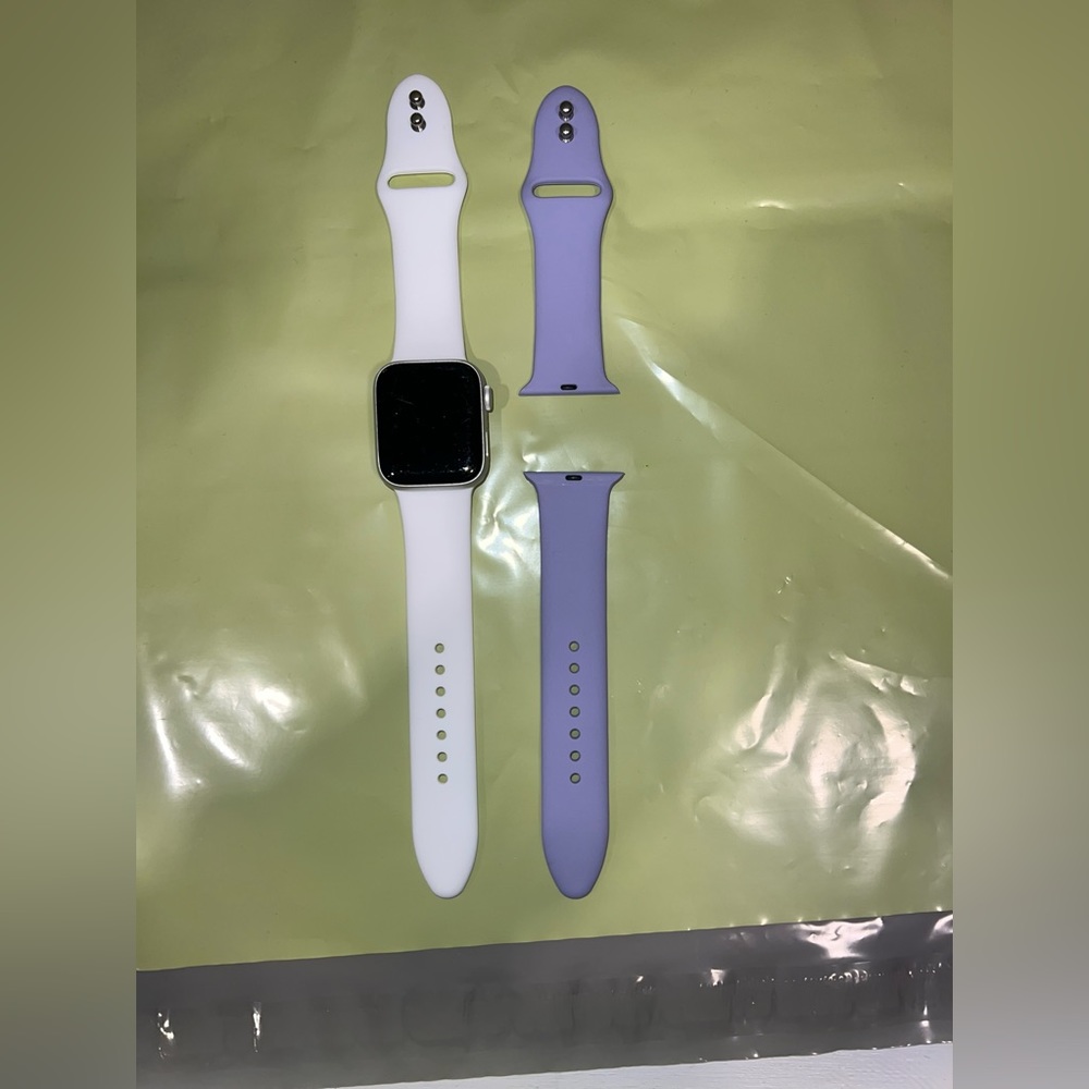Apple Watch with White and Purple Bands